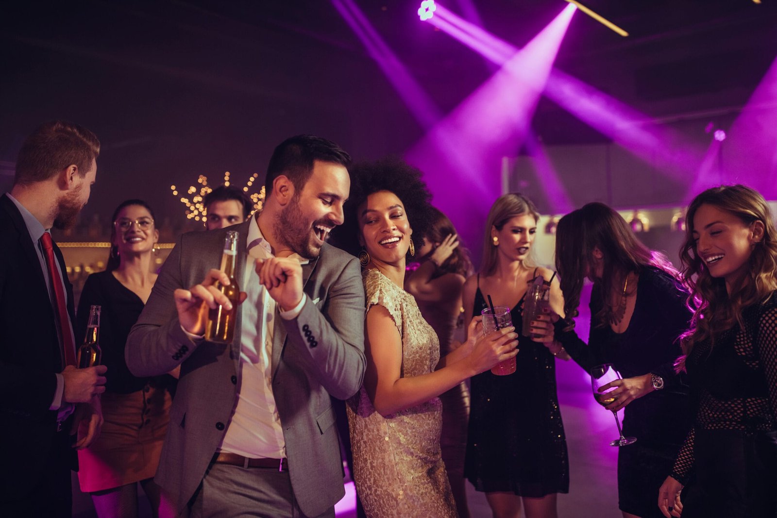 People enjoying nightclub party wearing bounze insoles for comfortable event dancing